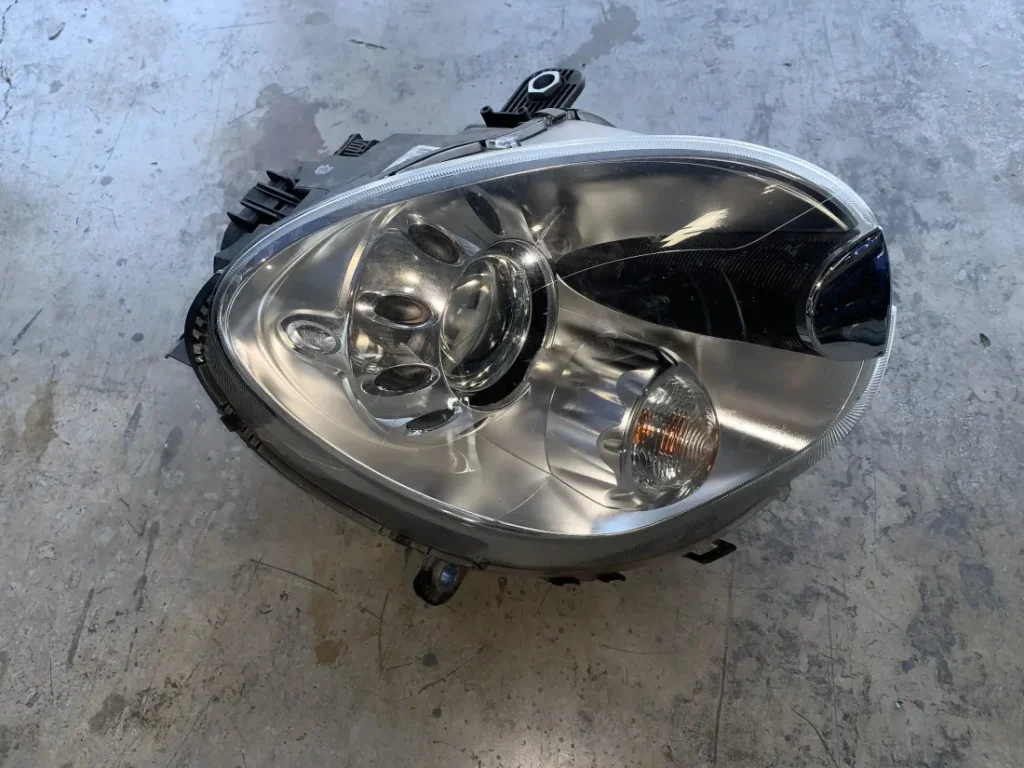 ΠΡΟΒΟΛΕΑΣ ΕΜΠΡΟΣ ΦΩΤΑ BI-XENON ΔΕΞΙΑ MINI R60 R61 (ΚΩΔ. ΑΝΤΑΛ. 9807480)